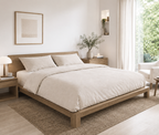 Minimal bedroom interior with beige bamboo duvet cover, bamboo bedsheet and matching pillowcases