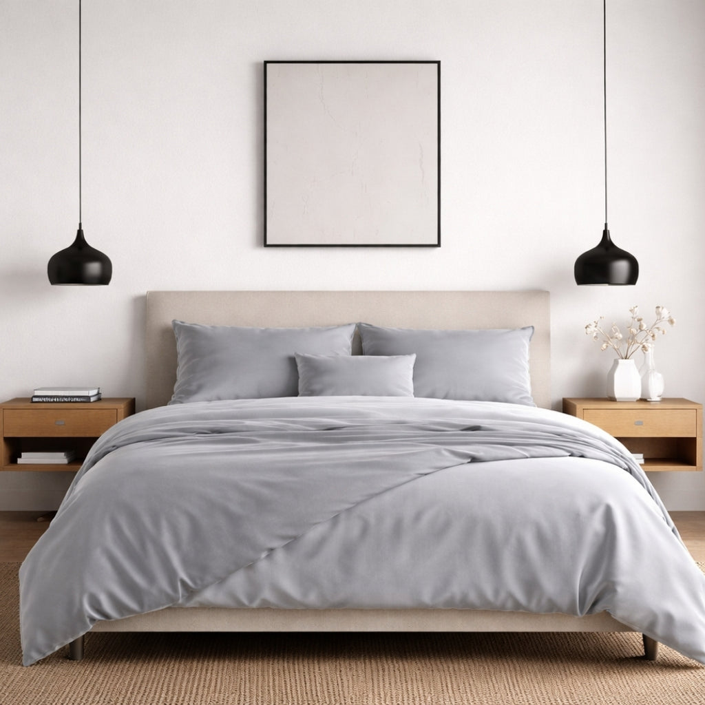 Modern bedroom interior with grey bamboo duvet cover and matching pillowcases.