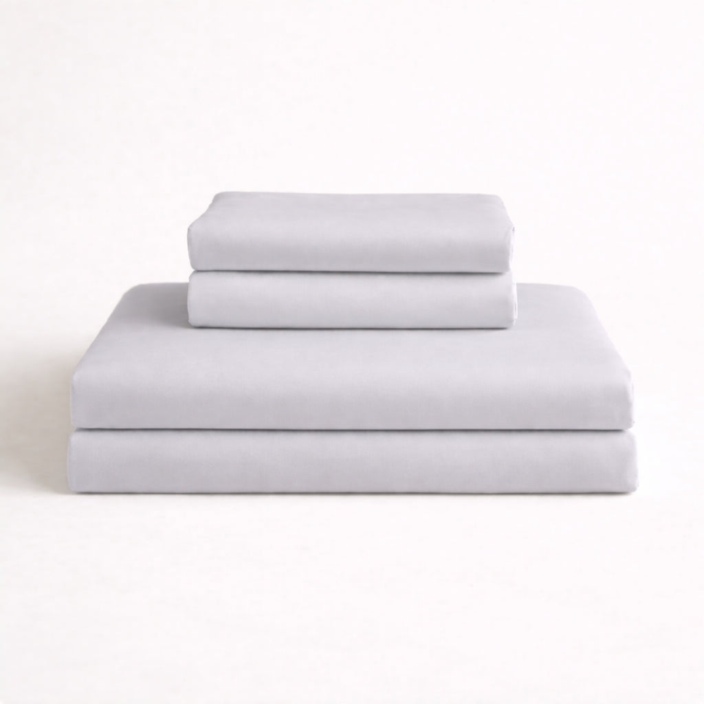 Folded light grey complete bamboo bed linen set: Includes fitted sheet, duvet cover and two pillowcases
