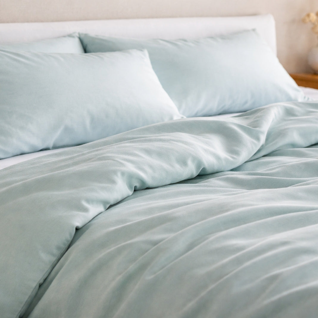 sage high thread count bamboo duvet set on a bed